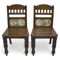 A Pair of Substantial Gothic Revival Oak Hall Chairs with Period Tiles