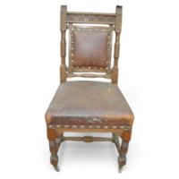 A Set of Four Gothic Revival Dining Chairs