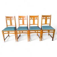 A set of four Arts and Crafts oak dining chairs - Thumbnail 1