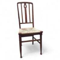 An Arts and Crafts Rush Seat Side Chair with Upside Down Pierced Heart