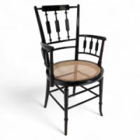 Rhoda and Agnes Garrett., An Aesthetic Movement Cane Seated Armchair