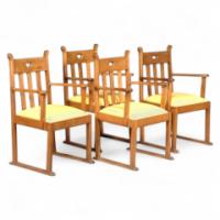 Liberty and Co. A pair of oak armchair in the manner of E G Punnett - Thumbnail 1