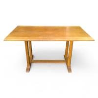 Heals of London. An Arts and Crafts light oak six to eight seat refectory dining table - Thumbnail 1
