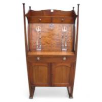 J S Henry. A 'flame mahogany' bureau bookcase - Thumbnail 1