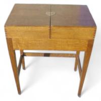 George Walton. An Arts and Crafts oak fold over writing desk - Thumbnail 1