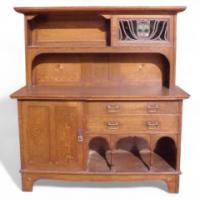 P E Gane. An oak Arts and Crafts sideboard in the manner of E A Taylor - Thumbnail 1