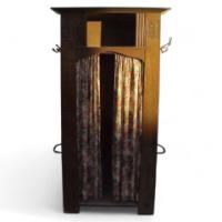 M H Baillie Scott (style of). An excellent oak Arts and Crafts hall cupboard with stylised floral carvings - Thumbnail 1