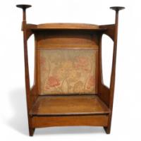 Liberty and Co. An Arts and Crafts oak settle with fabric of The Silver Studio's - Thumbnail 1