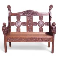A Celtic Arts and Crafts carved oak settle with carved dragons to the tops - Thumbnail 1