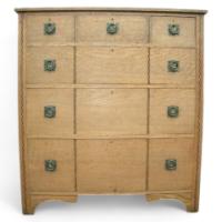 An Arts and Crafts oak inlaid chest of drawers - Thumbnail 1