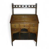 Liberty & Co., An Oak Bureau in the Moorish Style with Moucharabieh Turning - Thumbnail 1