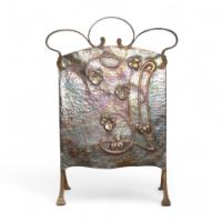 An Arts and Crafts Copper Fire Screen with Repousse Stylised Floral Details