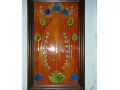 A large tube lined tile depicting stylised flowers in rich colours - Thumbnail 1