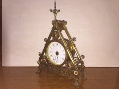 Bruce Talbert. A Reformed Gothic brass triform mantel timepiece - Thumbnail 2