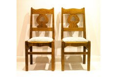 C F A Voysey for Liberty and Co. A rare pair of oak chairs. - Thumbnail 1