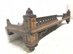 A Gothic Revival walnut wall shelf with carved foliate details - Thumbnail 4