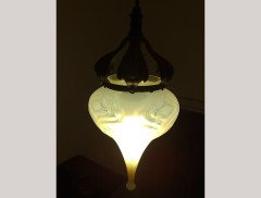 A good Vaseline pendant with brass ceiling rose and a stylised floral mount to the centre of the wire. - Thumbnail 2