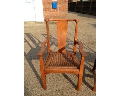 Arthur Simpson. An armchair with shaped back and original ratten drop - Thumbnail 3