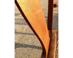 Arthur Simpson. An armchair with shaped back and original ratten drop - Thumbnail 8