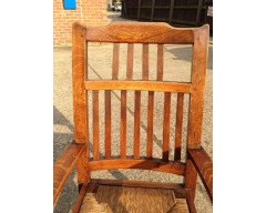 Arthur Simpson. An armchair with shaped back and original ratten drop - Thumbnail 10