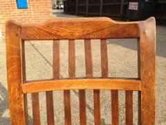 Arthur Simpson. An armchair with shaped back and original ratten drop - Thumbnail 11
