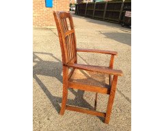 Arthur Simpson. An armchair with shaped back and original ratten drop - Thumbnail 13