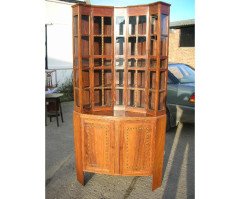 A walnut corner cupboard after a design by Ernest Gimson and Sidney Barsnley - Thumbnail 3