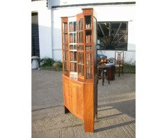 A walnut corner cupboard after a design by Ernest Gimson and Sidney Barsnley - Thumbnail 4