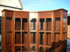 A walnut corner cupboard after a design by Ernest Gimson and Sidney Barsnley - Thumbnail 8