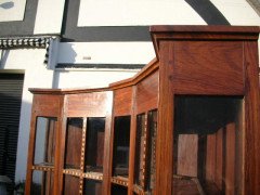 A walnut corner cupboard after a design by Ernest Gimson and Sidney Barsnley - Thumbnail 9