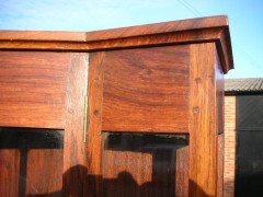 A walnut corner cupboard after a design by Ernest Gimson and Sidney Barsnley - Thumbnail 10