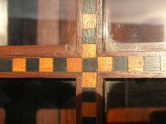 A walnut corner cupboard after a design by Ernest Gimson and Sidney Barsnley - Thumbnail 12