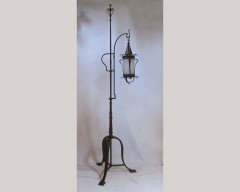 An Arts and Crafts adjustable iron standard lamp - Thumbnail 1