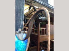 A pair of Arts and Crafts copper wall lights with peacock blue enamel heart shaped back plates. - Thumbnail 4