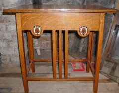 G M Ellwood for J S Henry. An Arts and Crafts oak centre table - Thumbnail 1