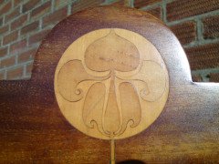 J S Henry (attributed). An Arts and Crafts armchair with stylised floral inlays - Thumbnail 10