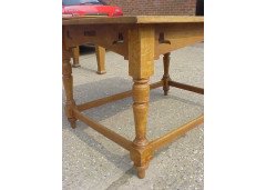 An Arts and Crafts oak dining table with Voysey style doves bird cut-outs to each corner - Thumbnail 3