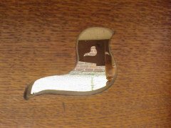 An Arts and Crafts oak dining table with Voysey style doves bird cut-outs to each corner - Thumbnail 4