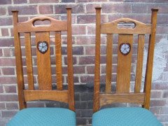 G M Ellwood for J S Henry. A set of six Arts and Crafts oak dining chairs inlaid with pewter and Ebony hearts - Thumbnail 3