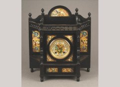 An Aesthetic Movement ebonised and gilt painted panel mantel clock - Thumbnail 1