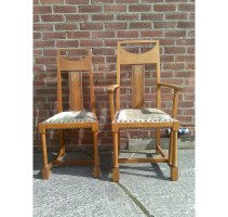 G M Ellwood for J S Henry. A rare and important Arts and Crafts oak armchair and matching side chair - Thumbnail 1