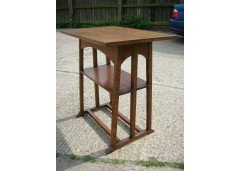 G M Ellwood for J S Henry. A matching pair of architectural Arts and Crafts oak side tables (only one shown) - Thumbnail 1