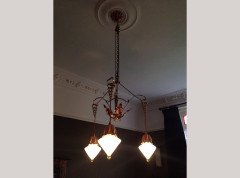 WAS Benson. An impressive copper and brass chandelier retaining the original James Powell of Whitefriars Vaseline glass shades - Thumbnail 11