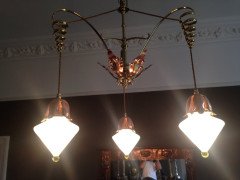 WAS Benson. An impressive copper and brass chandelier retaining the original James Powell of Whitefriars Vaseline glass shades - Thumbnail 12