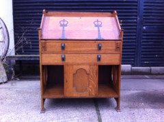 J S Henry. An Arts and Crafts oak bureau with elongated brass handles - Thumbnail 1