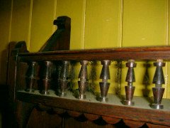E W Godwin (attributed). An oak hanging bookcase, with portrait medallion roundels in moulded vulcanite - Thumbnail 6