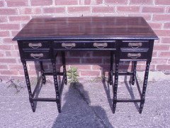Collinson and Lock. An eight leg ebonised desk with a Makassar Ebony top. - Thumbnail 2