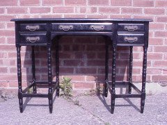 Collinson and Lock. An eight leg ebonised desk with a Makassar Ebony top. - Thumbnail 3
