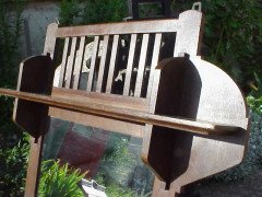 Leonard Wyburd for Liberty and Co. A rare Liberty and Co Arts and Crafts oak wall mirror/paper rack - Thumbnail 2