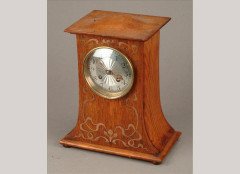 Liberty and Co. An Arts and Crafts oak and inlaid mantel clock - Thumbnail 1